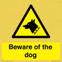 beware-of-the-dog-with-dog-warning-symbol~